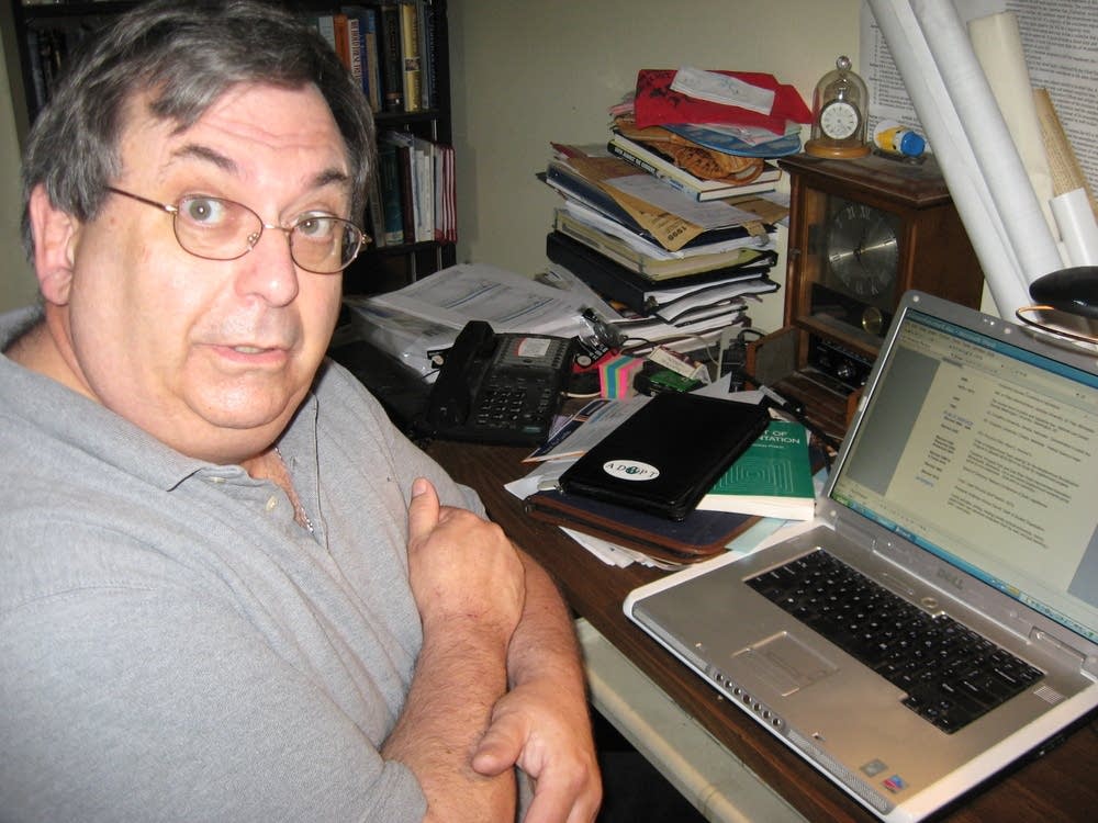 Steve Cross works on resume