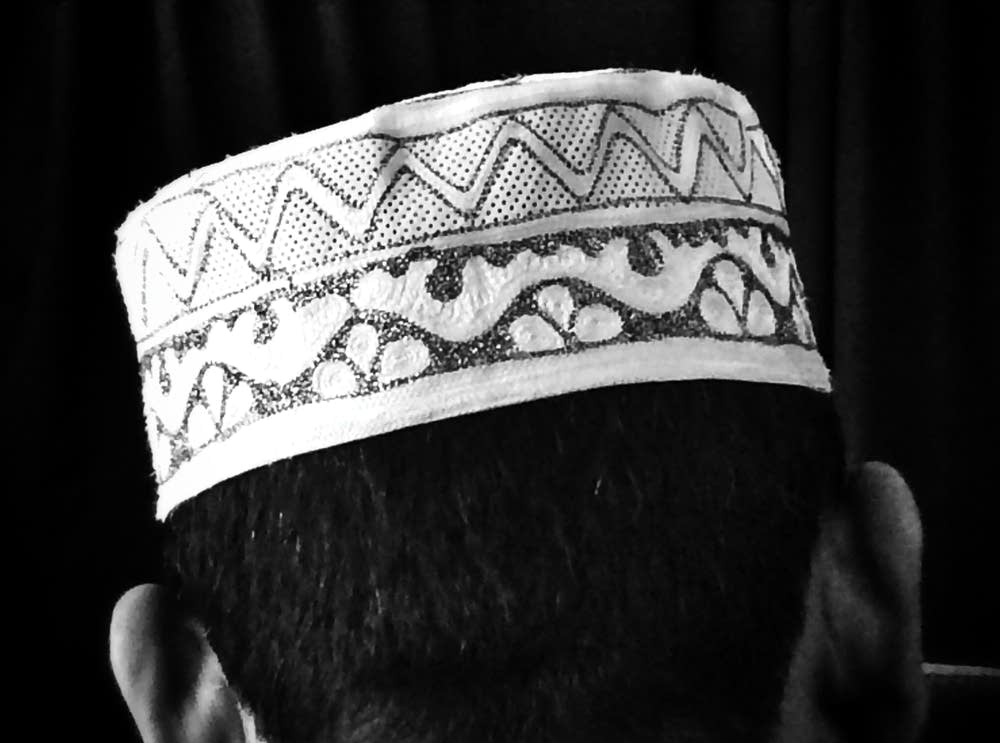 A Muslim man in traditional headwear