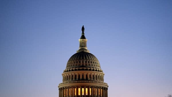 The U.S. Capitol stands at dawn on Jan. 12, 2021 in Washington.