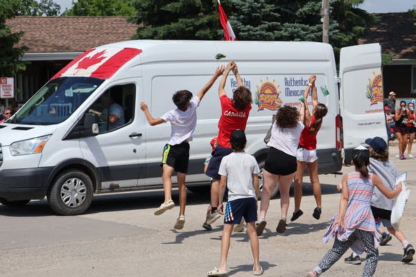 Children jump for candy
