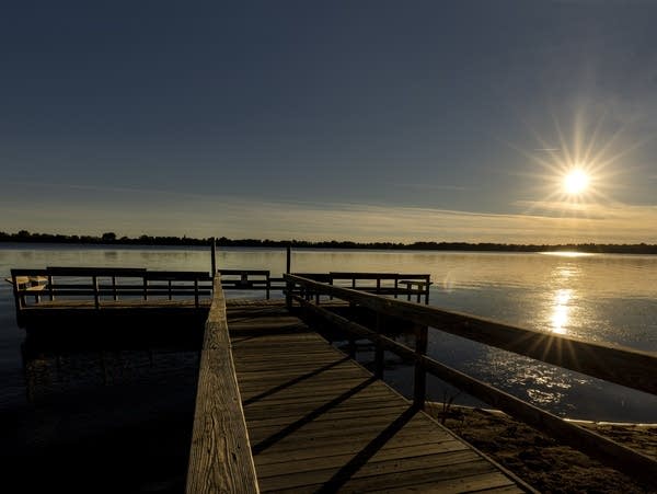 The sun begins to set over Andrew Lake