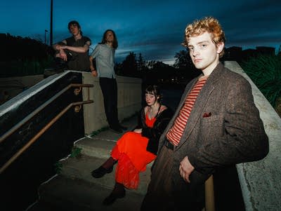 Four people pose for a photo in Duluth.