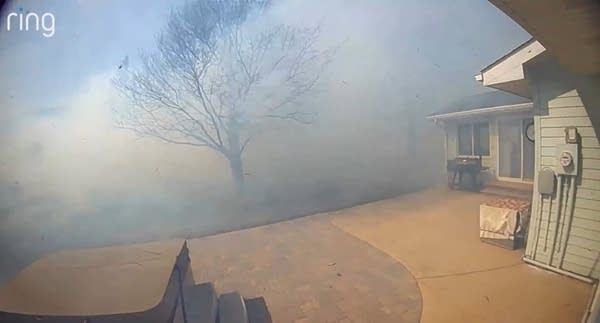 Grass fire singes yards in western Minnesota