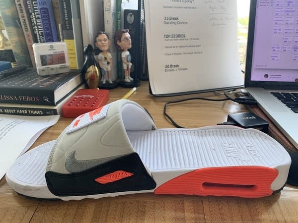 Photo of a slip-on casual Nike sandal or flip-flop or "slide"