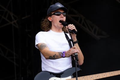 Heart to Gold performing on an outdoor stage.