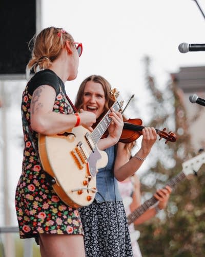 Two people performing on stage