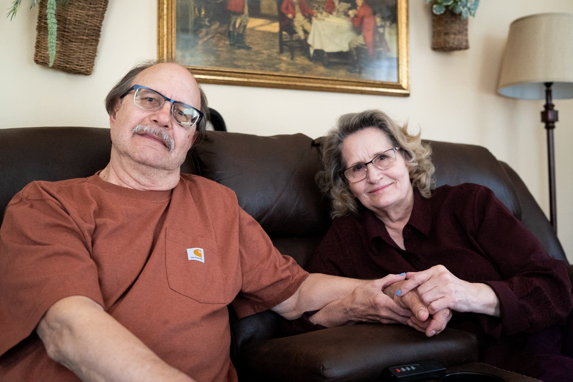 Charlie and Diane Stuns sit for a portrait in their St. Paul home