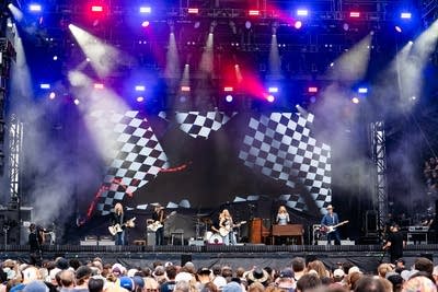 Sheryl Crow performing on stage