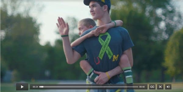Michigan boy carries brother for 57 miles