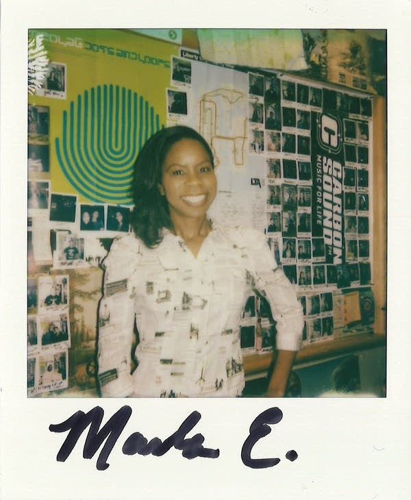 a woman posing in a polaroid photo in the carbon sound studio