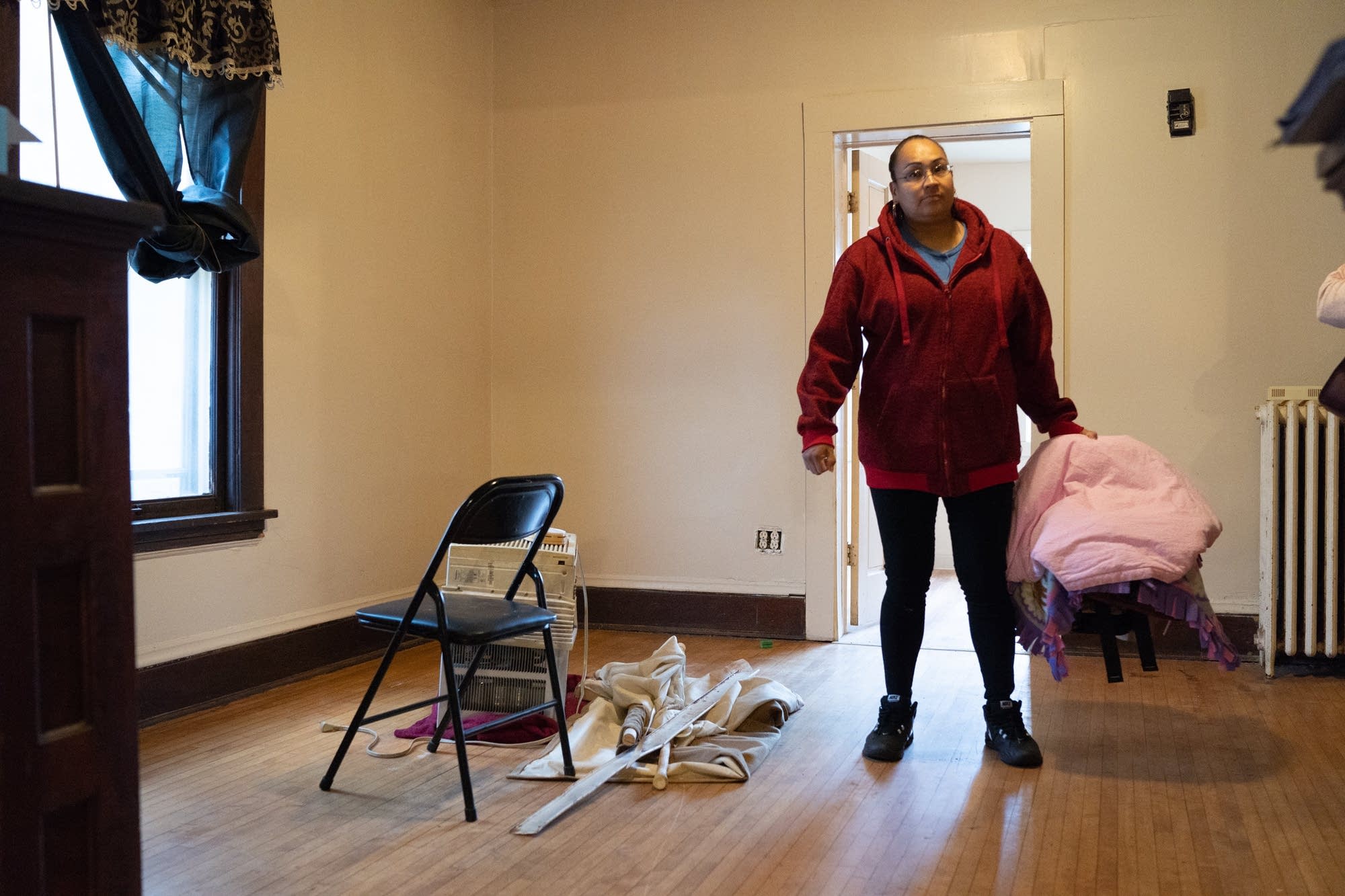 Melody Johnson checks out a north Minneapolis apartment.