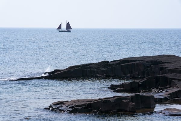 Man thrown from boat in Lake Superior swims to safety