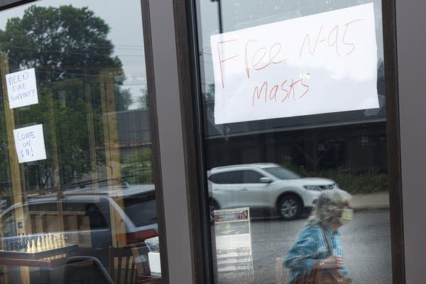 A handwritten sign reading