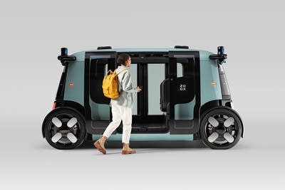 Woman entering a Zoox Robotaxi