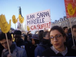 People gather at Republique square to protest against anti-Semitism