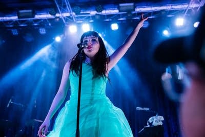 Lauren Mayberry performing on stage