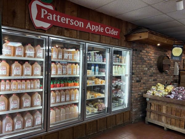 The apple cider fridges in the Patterson Fruit Farm market feature the same cartons that are sold in local grocery stores.