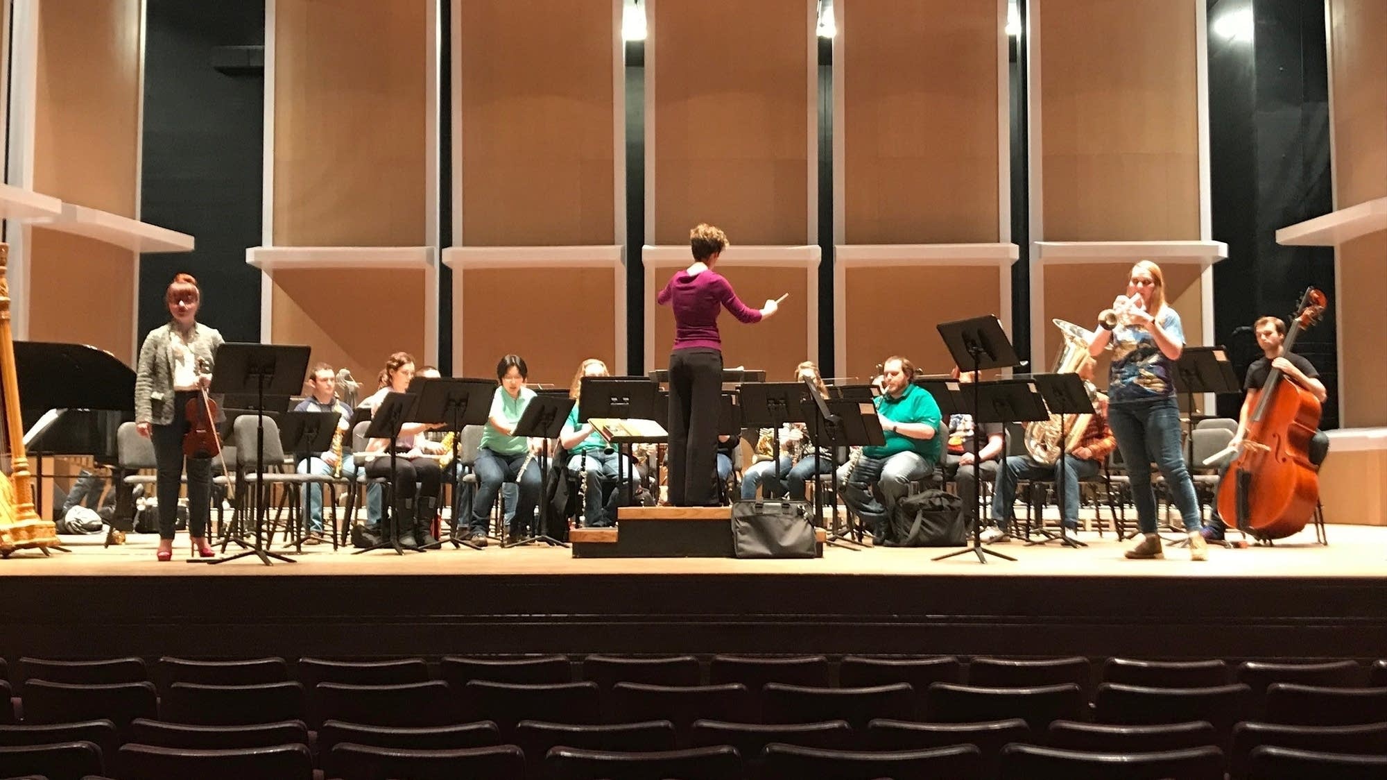 Judy Gaunt, right, rehearses with the U Wind Ensemble.