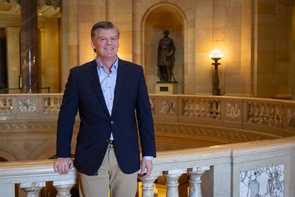 A man stands in the capitol rotunda.