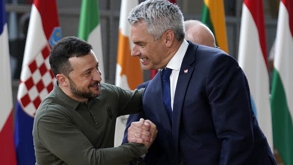 Volodymyr Zelensky meets Karl Nehammer, Federal Chancellor of Austria at a European Council meeting.
