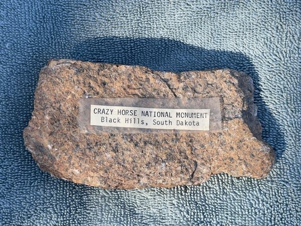 A piece of granite 'paperweight' from the Crazy Horse Memorial