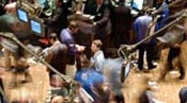 Traders on floor of the New York Stock Exchange
