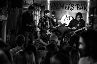 a rock band performing on a stage