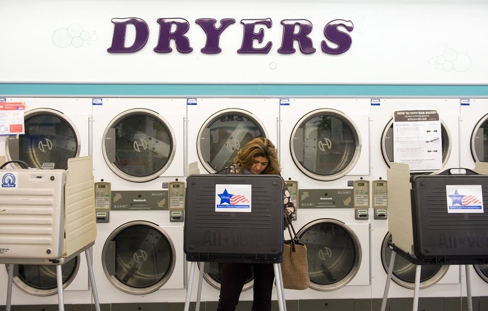 A voter casts her ballot in the US presi