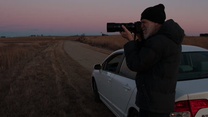 Neal Deunk photographs geese at a wildlife refuge.