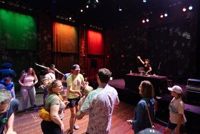 kids and their parents enjoying the current's rock the cradle