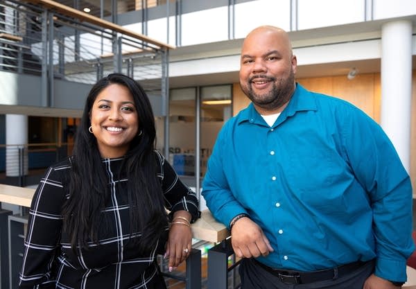 two people pose for a portrait 