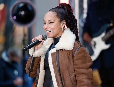 A woman singing onstage