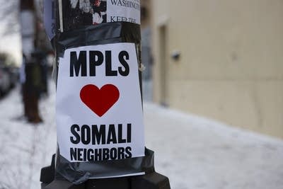 A sign reading “MPLS loves Somali neighbors” 