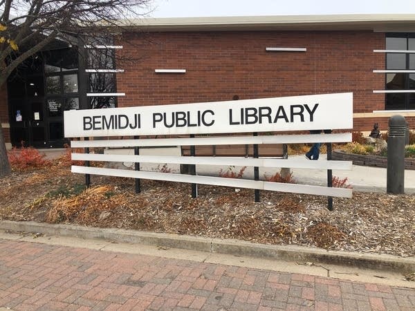 A white sign reading "Bemidji Public Library."