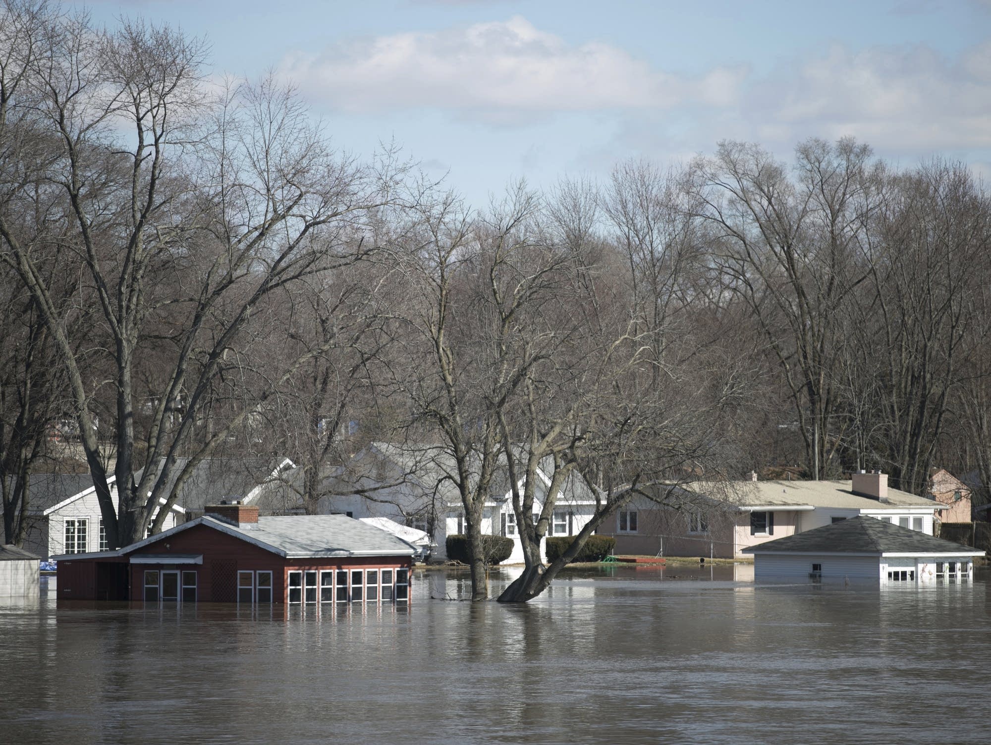 The Rock River floods part of Machesney Park, Ill.