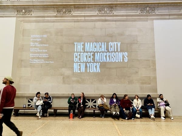9d12b4-20251021-people-walk-in-front-of-a-projection-600 Minnesotans celebrate George Morrison exhibition in New York