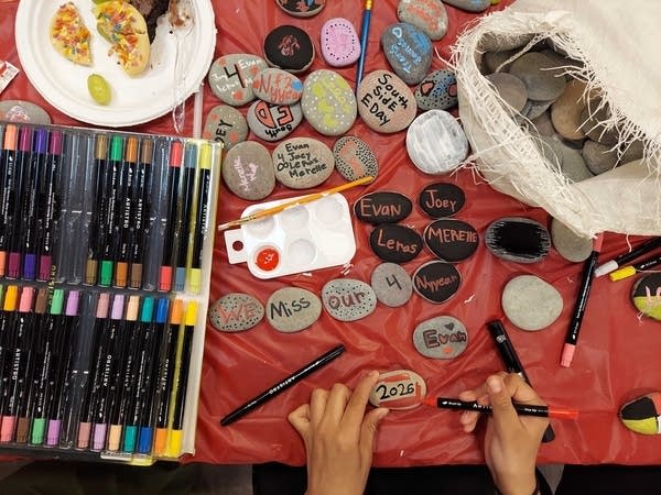 People paint rocks
