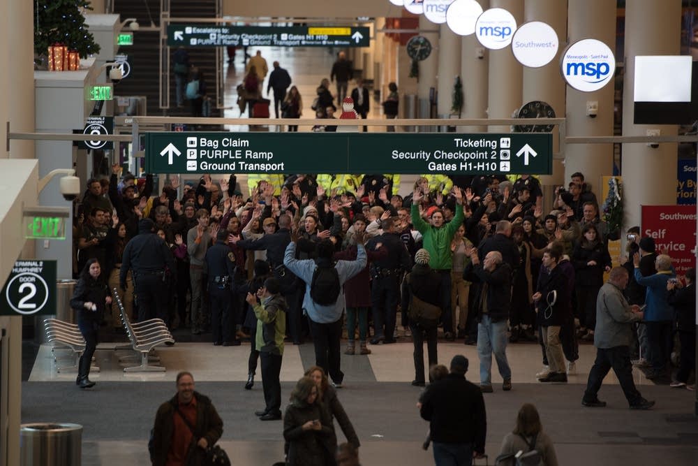 Protesters gather in Terminal 2.
