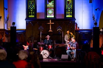 A band performing onstage