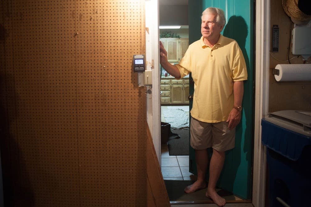 Keith Kuby tests his home for radon
