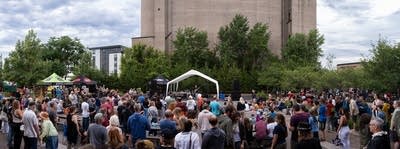 people enjoying the currents happy hour at surly brewing