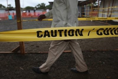 Workers prepare a new Ebola treatment center.
