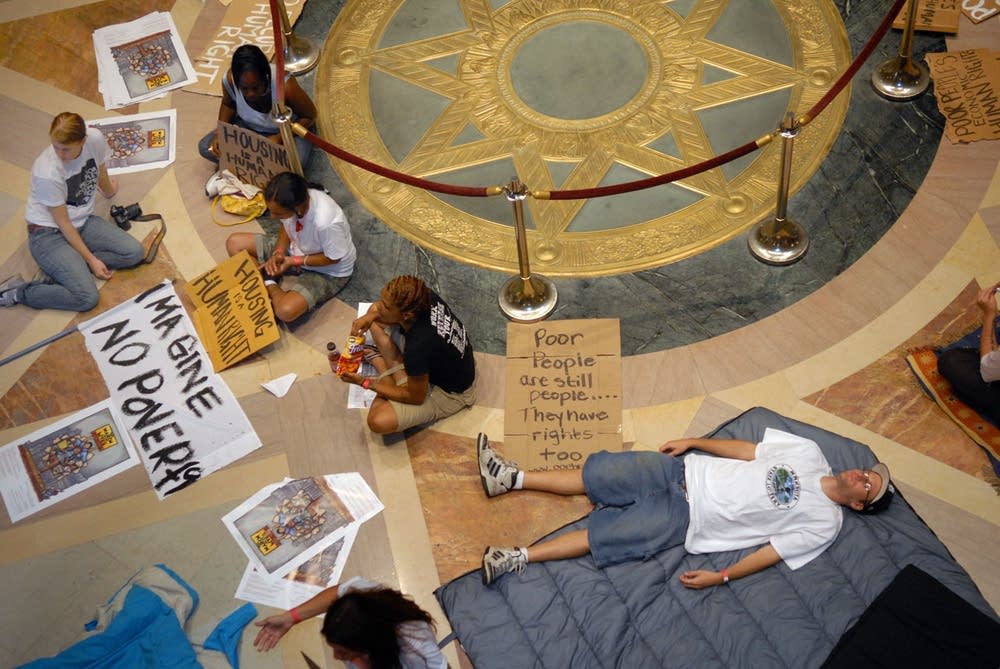 A human rights group protests at the State Capitol