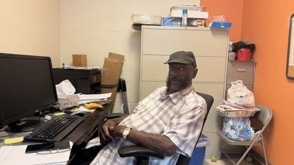 James Chavis at his desk volunteering with the local chapter of Partners Against Crime. Social Security is his only source of retirement income. 