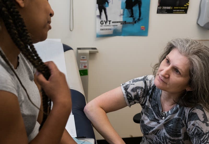 Loral Patchen consults with a student.