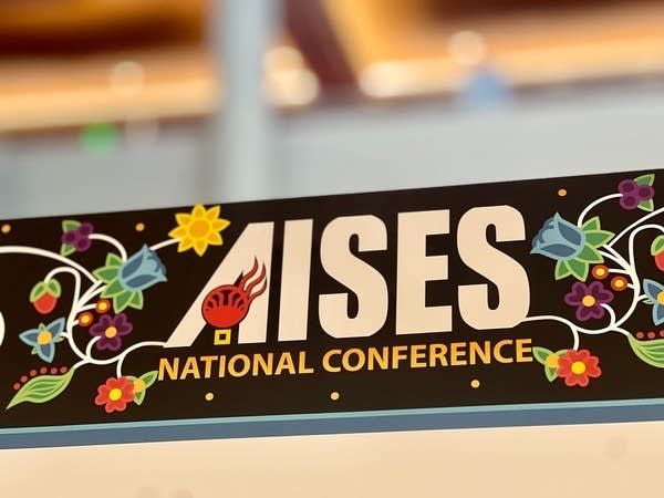 Closeup of signage that reads, "AISES National Conference."