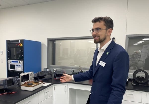 man stands in science lab