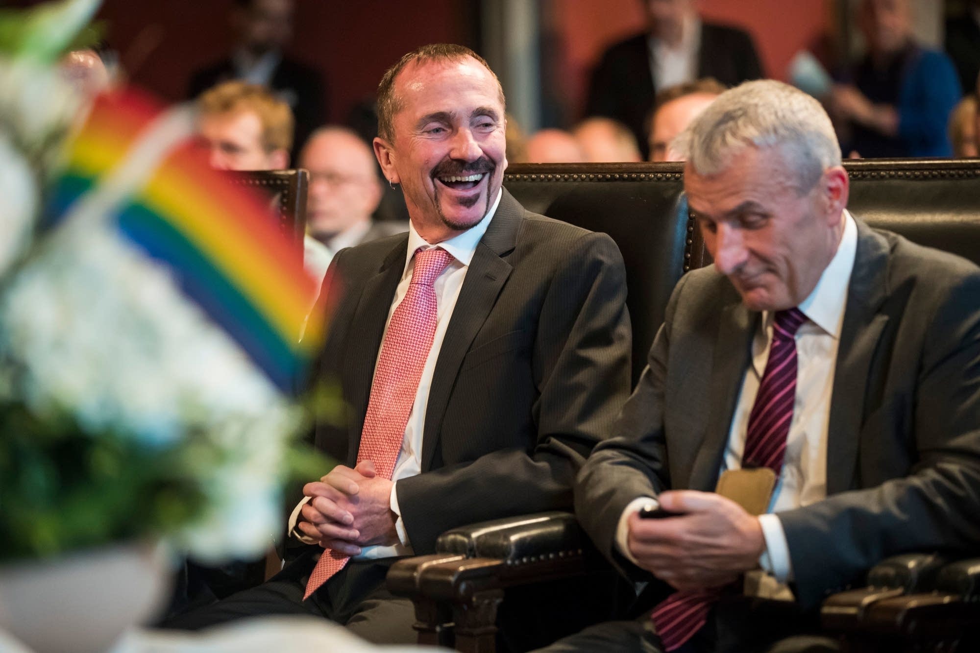 Bode Mende (R) and Karl Kreile react during their wedding ceremony
