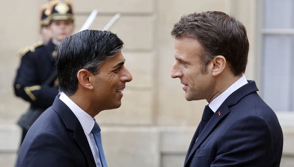French President Emmanuel Macron welcomes British Prime Minister Rishi Sunak prior to the 36th Franco-British Summit at the Elysee Palace in Paris, France. 
