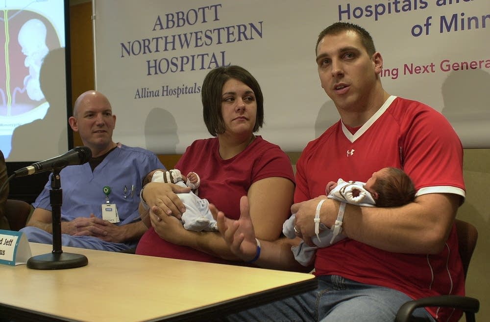 Jean and Jeff Cassellius hold their new twins